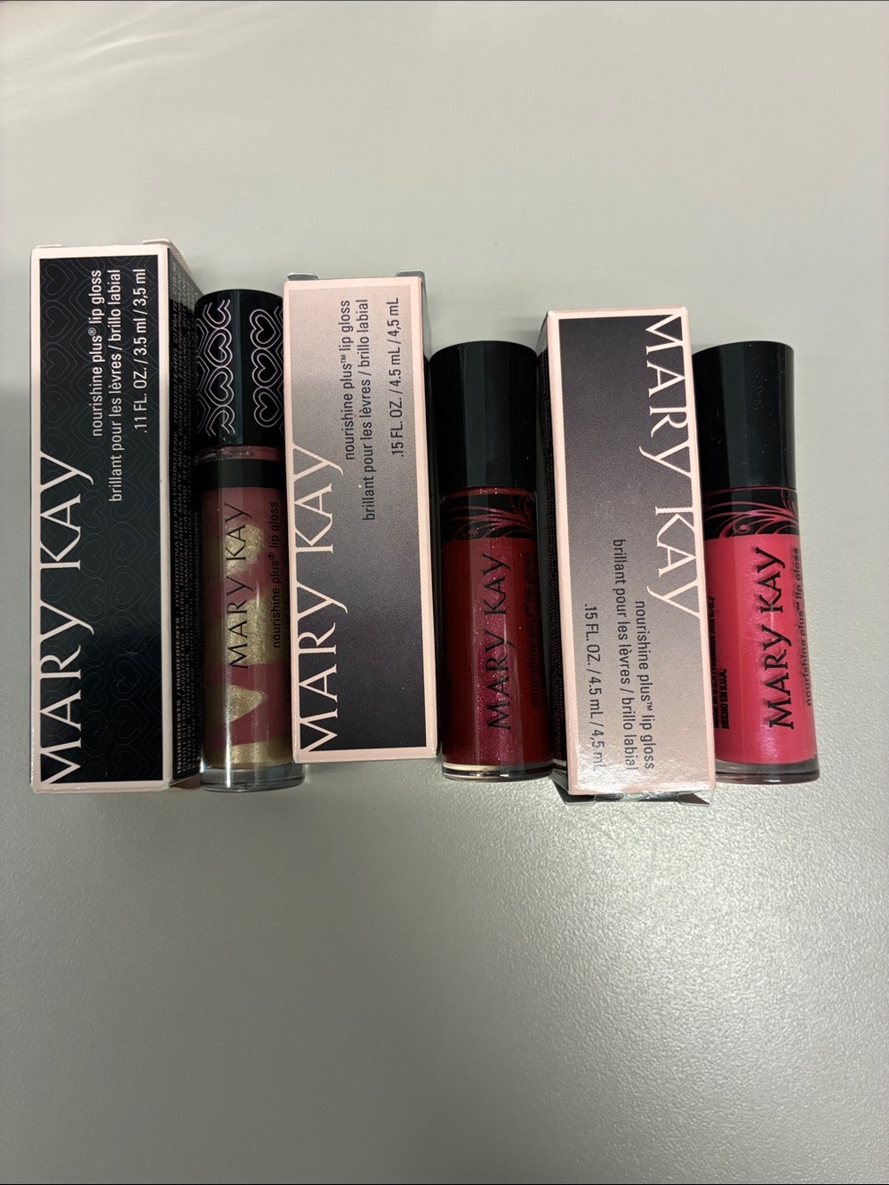 Mary Kay Lip Gloss Trio — Bright Pink, Deep Red, & Shimmery Gold